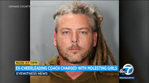 Former California Cheerleading Coach Charged With Molesting Girls