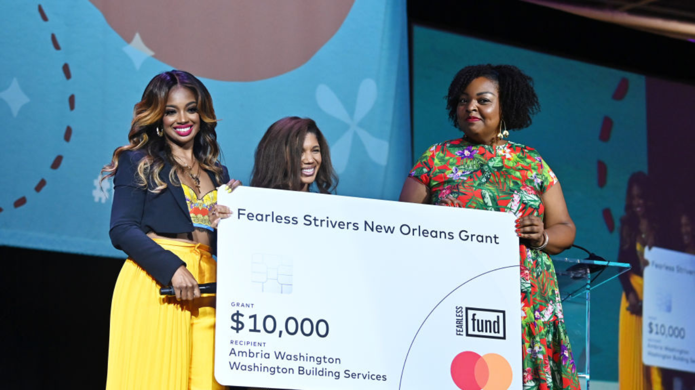 CEO Arian Simone donating Fearless Fund Striver's Grant at Essence Fest