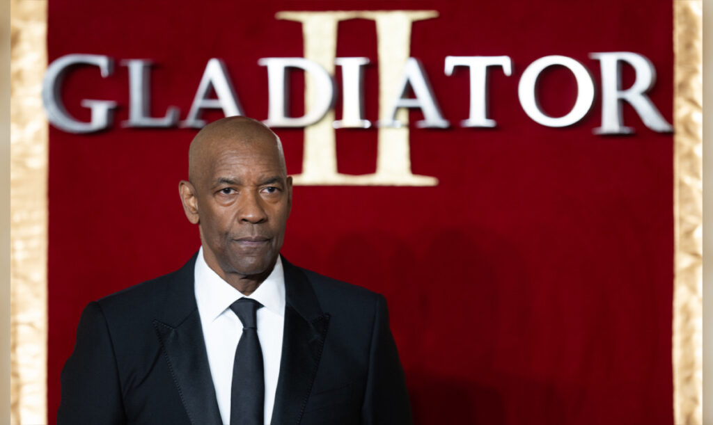 Denzel Washington Clarifies Gladiator II “Gay Kiss” After Director Ridley Scott Claims It Didn’t Happen