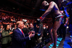 UFC Champ Jon Jones Retains Heavyweight Title And Gives Title Belt To President-Elect Donald Trump After TKO Victory