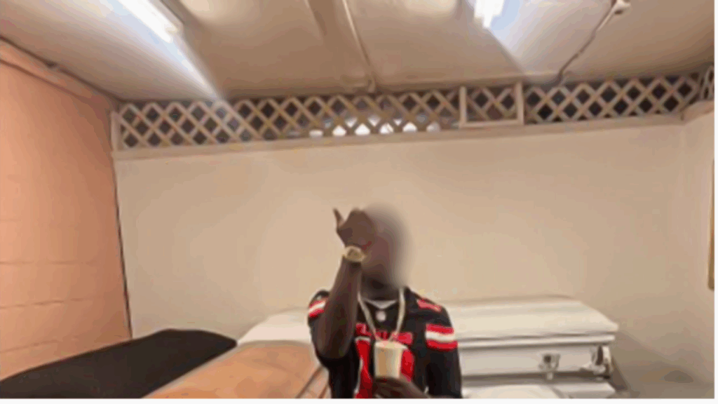 Texas Funeral Home Employee Fired After Posting Gun Photo With Casket to Gain Social Media Clout