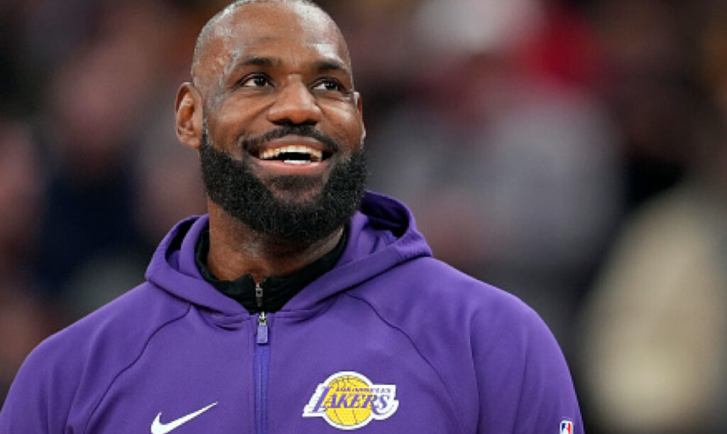 Watch the Cool Moment LeBron James Signs a Kid’s Sneakers After His Dad Tells Him to Say Please”
