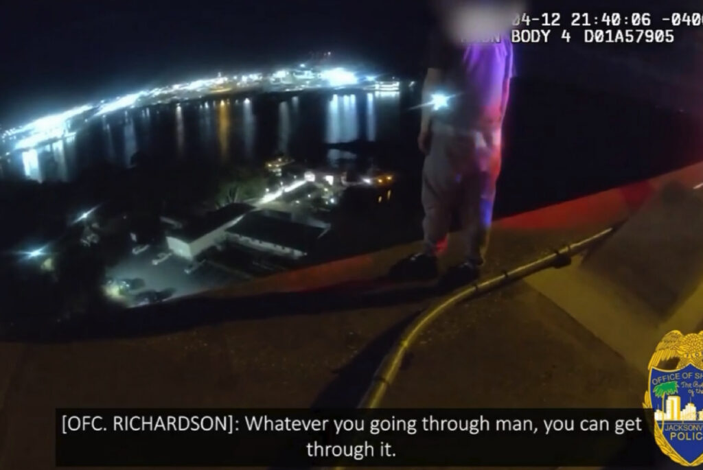 Emotional Moment Shows Jacksonville Officer Offering A Helping Hand To Man On Bridge